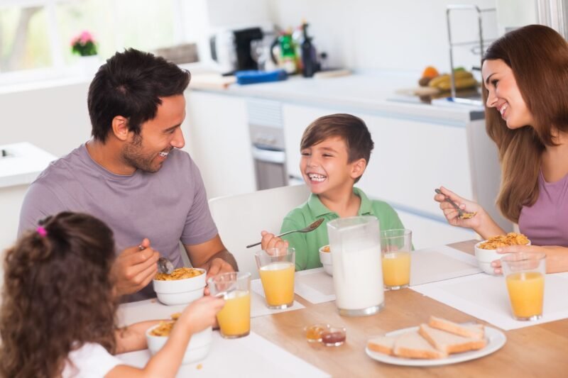 A Happy Family at Dinning Table
