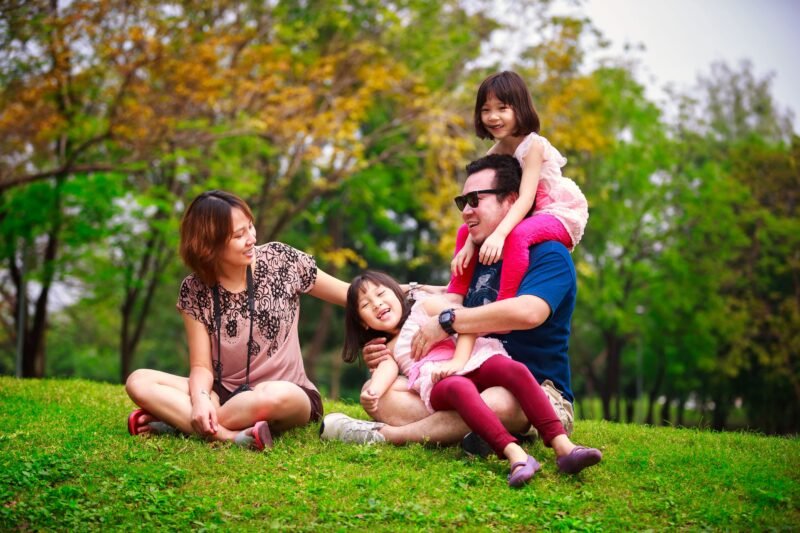 A family playing with children at Garden
