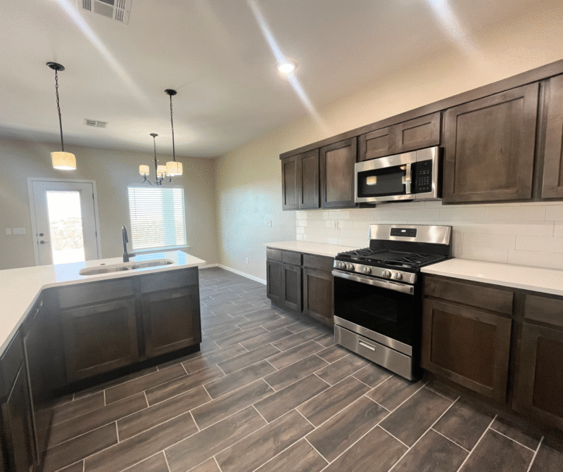Dining area with table and pendant lights