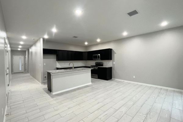 TV lounge with attached kitchen
