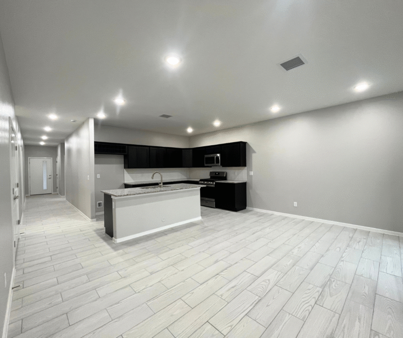 TV lounge with attached kitchen