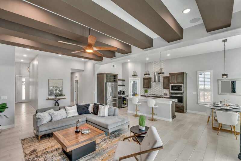 Bright open kitchen and dining area in a model home