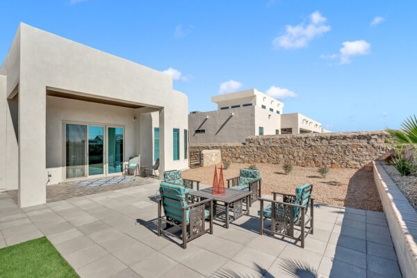 Backyard patio with outdoor seating at a modern home
