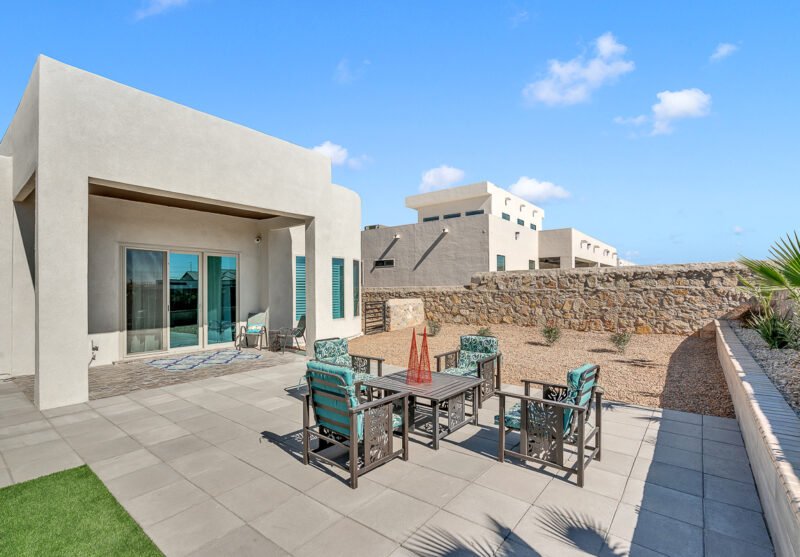 Backyard patio with outdoor seating at a modern home