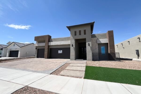 New construction home exterior with garage