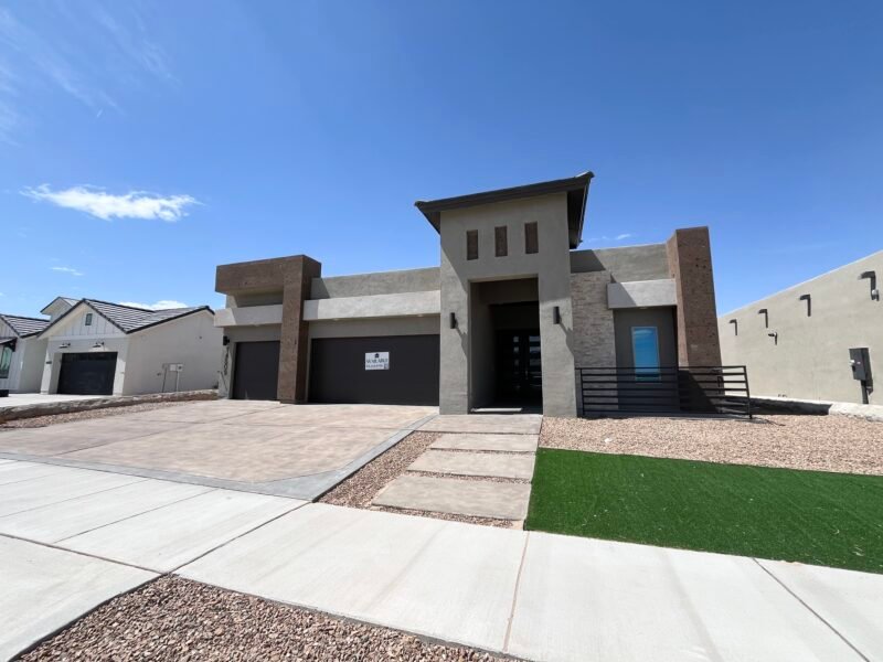 New construction home exterior with garage