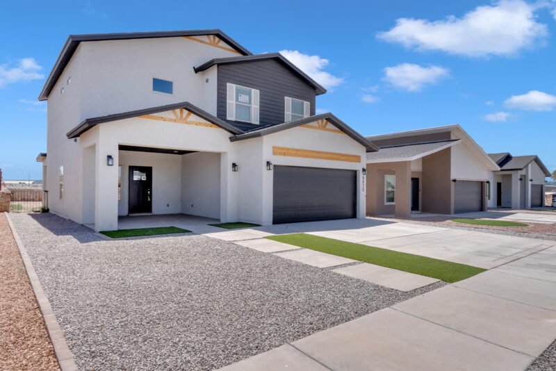 modern style gray and white double story with garage left cornor